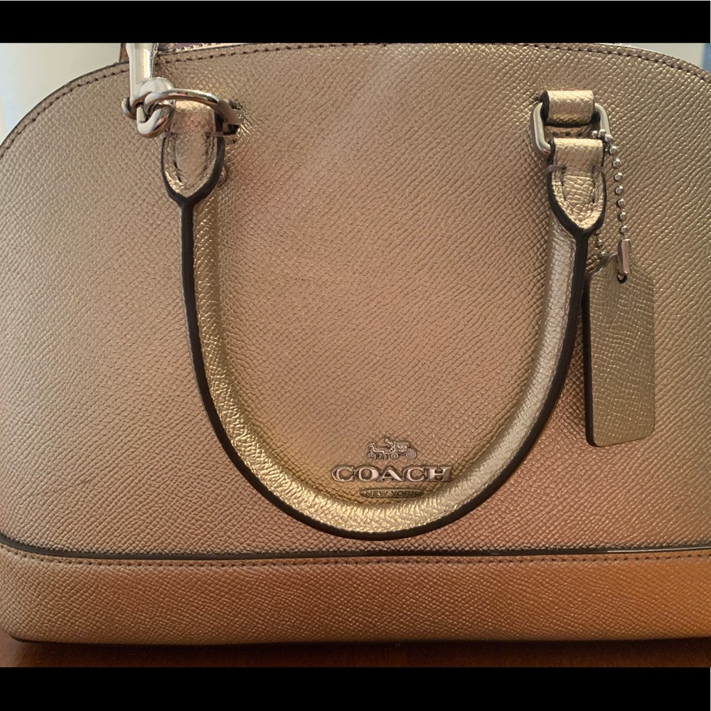 Coach rose gold crossbody